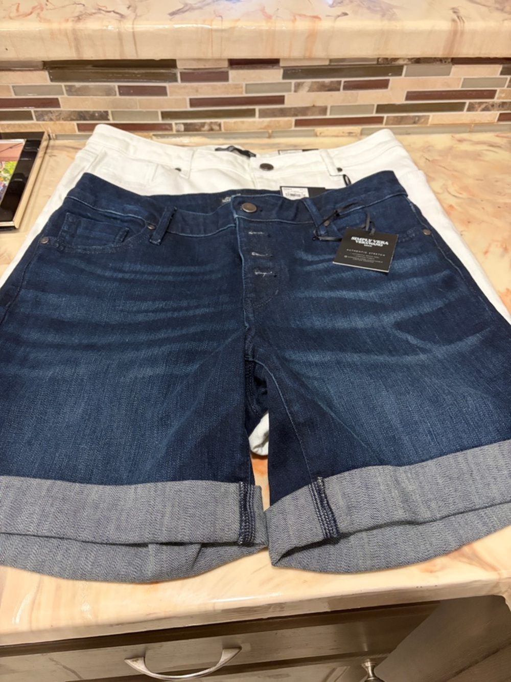 Simply vera. Two pair of shorts.  Denim and white
